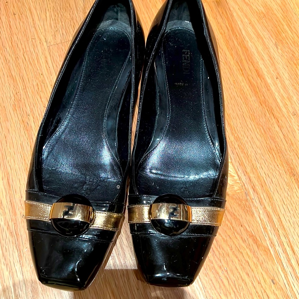 Black Fendi shoes(worn but in good condition)with fendi logo on top